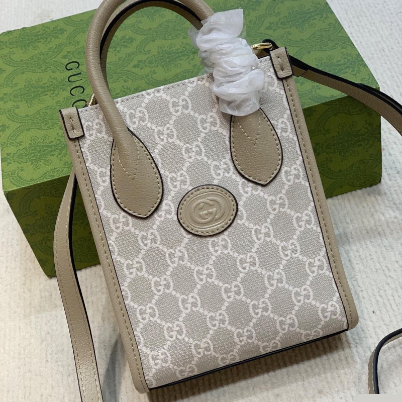 G*u*i top handle bags